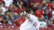 Aug 20, 2015; Cincinnati, OH, USA; Cincinnati Reds left fielder Skip Schumaker (55) hits a double against the Arizona Diamondbacks in the second inning at Great American Ball Park. Mandatory Credit: David Kohl-Imagn Images