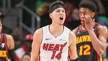Apr 9, 2024; Atlanta, Georgia, USA; Miami Heat guard Tyler Herro (14) reacts after a basket against the Atlanta Hawks in the second half at State Farm Arena. Mandatory Credit: Brett Davis-Imagn Images