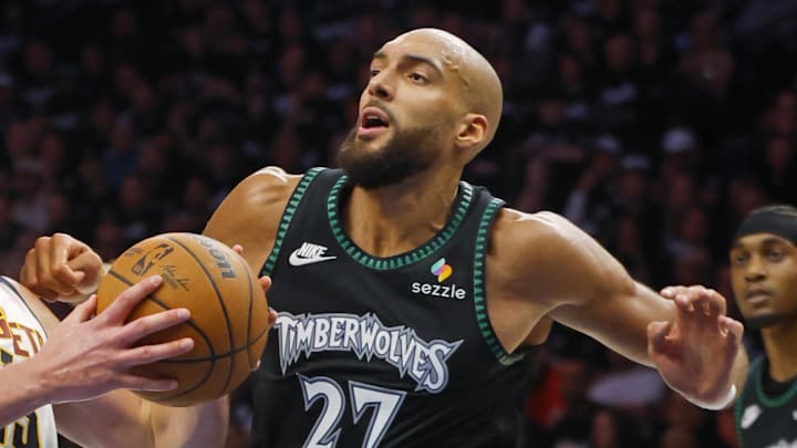Apr 23, 2026; Minneapolis, Minnesota, USA; Denver Nuggets center Nikola Jokic (15) goes to the basket against Minnesota Timberwolves center Rudy Gobert (27) in the third quarter at Target Center. Mandatory Credit: Bruce Kluckhohn-Imagn Images