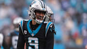 Nov 30, 2025; Charlotte, North Carolina, USA; Carolina Panthers quarterback Bryce Young (9) celebrates after a touchdown during the third quarter against the Los Angeles Rams at Bank of America Stadium.