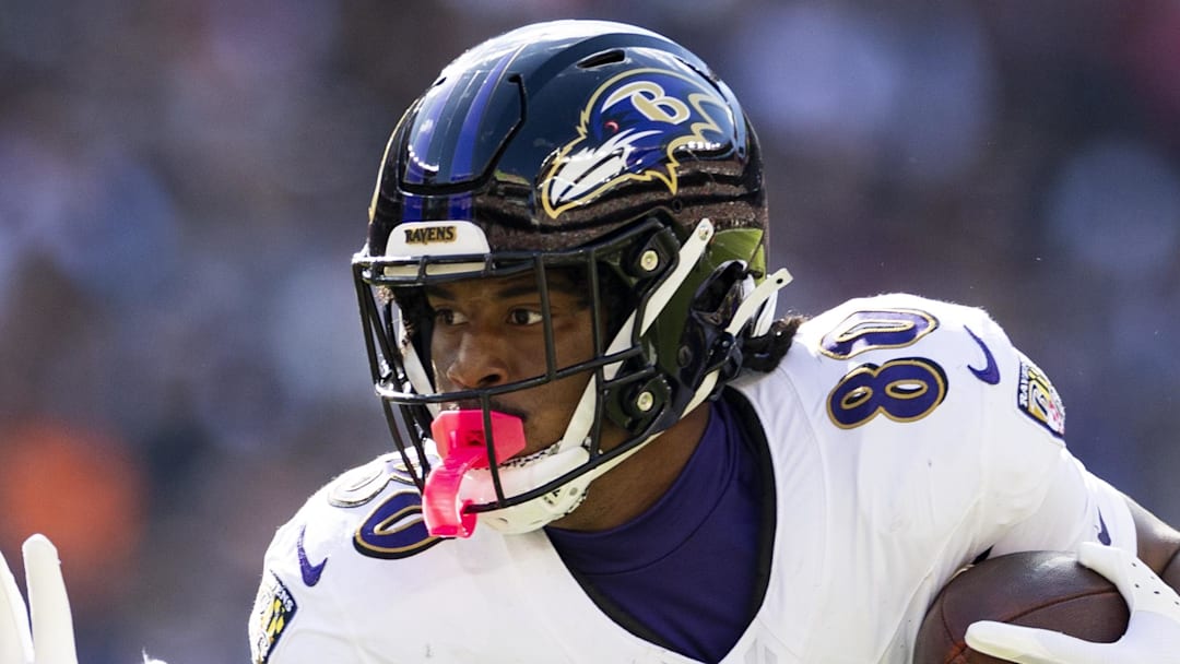 Oct 27, 2024; Cleveland, Ohio, USA; Baltimore Ravens tight end Isaiah Likely (80) runs the ball against the Cleveland Browns during the first quarter at Huntington Bank Field. Mandatory Credit: Scott Galvin-Imagn Images