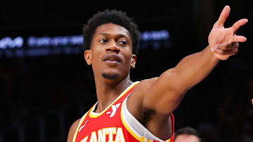 De'Andre Hunter #12 of the Atlanta Hawks celebrates a made basket.