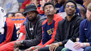 Jan 15, 2025; New Orleans, Louisiana, USA; New Orleans Pelicans forward Zion Williamson, left, center Yves Missi, and forward Herbert Jones (2) watch from the bench during the second half against the Dallas Mavericks at Smoothie King Center. Mandatory Credit: Matthew Hinton-Imagn Images
