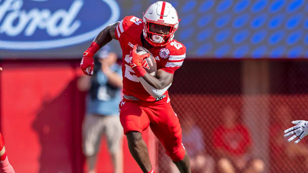 Nebraska running back Emmett Johnson rushes for nine yards against Houston Christian.
