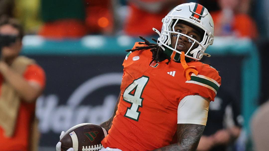 Sep 13, 2025; Miami Gardens, Florida, USA; Miami Hurricanes running back Mark Fletcher Jr. (4) celebrates after scoring a touchdown against the South Florida Bulls during the second quarter at Hard Rock Stadium. Mandatory Credit: Sam Navarro-Imagn Images