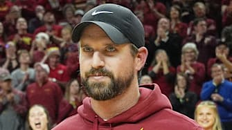 Iowa State football coach Jimmy Rogers speaks during a timeout in the first half in the Iowa State and Iowa men’s basketball Cy-Hawk series at Hilton coliseum on Dec. 11, 2025, in Ames, Iowa.