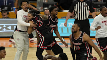 Houston players celebrate after the Cougars rally late to down Duke, 70-67, in the NCAA Final Four on April 5, 2025