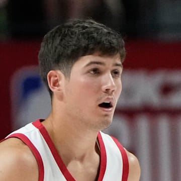 Jul 12, 2024; Las Vegas, NV, USA; Houston Rockets guard Reed Sheppard (15) dribbles the ball against the Los Angeles Lakers during the first half at Thomas & Mack Center. Mandatory Credit: Lucas Peltier-Imagn Images