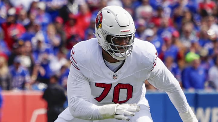 Sep 8, 2024; Orchard Park, New York, USA; Arizona Cardinals offensive tackle Paris Johnson Jr. (70) looks to block against the Buffalo Bills during the first half at Highmark Stadium. Mandatory Credit: Gregory Fisher-Imagn Images