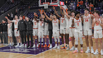 Dec 22, 2023; Clemson, South Carolina, USA; Clemson basketball team joins in the alma mater after the game with Queens University the game against Queens University at Littlejohn Coliseum. Mandatory Credit: Ken Ruinard-Imagn Images