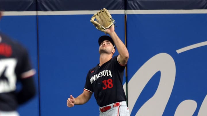 Sep 4, 2024; St. Petersburg, Florida, USA;  Minnesota Twins outfielder Matt Wallner (38) catches a fly ball against the Tampa Bay Rays during the third inning at Tropicana Field.