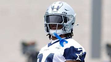 Dallas Cowboys running back Jaydon Blue (34) goes through a drill during practice at the Ford Center at the Star Training Facility in Frisco, Texas.
