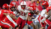 Nebraska running back Emmett Johnson en route to 108 rushing yards against Cincinnati.