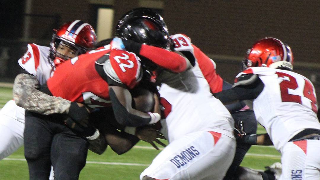 The Lugoff-Elgin defense swarms to tackle Westwood running back Jovan Howard. The Demons previaled 30-20. The Lugoff-Elgin defense swarms to tackle Westwood running back Jovan Howard. The Demons previaled 30-20.
