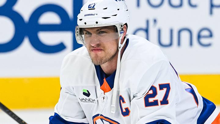 Mar 21, 2026; Montreal, Quebec, CAN; New York Islanders left wing Anders Lee (27) stretches during warm-up before the game against the Montreal Canadiens at Bell Centre. Mandatory Credit: David Kirouac-Imagn Images