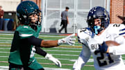 Butler's Deacon Simko looks to elude Allderdice defensive back Jayshaun Bocsy Friday afternoon at Cupples Stadium in Pittsburgh. Simko scored a touchdown to help the Golden Tornado win 35-8.