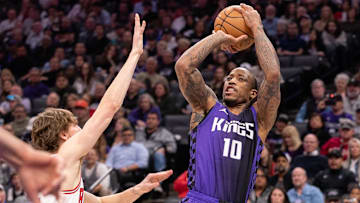 Mar 20, 2025; Sacramento, California, USA; Sacramento Kings forward DeMar DeRozan (10) takes a jump shot during the second quarter of the game against the Chicago Bulls at Golden 1 Center. Mandatory Credit: Ed Szczepanski-Imagn Images