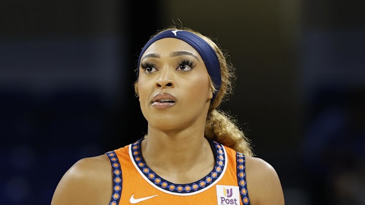 Jun 12, 2024; Chicago, Illinois, USA; Connecticut Sun guard DiJonai Carrington (21) looks on during the first half of a basketball game against the Chicago Sky at Wintrust Arena. Mandatory Credit: Kamil Krzaczynski-Imagn Images