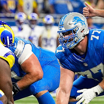 Detroit Lions quarterback Jared Goff (16) calls for a snap from center Frank Ragnow against tne Los Angeles Rams during the first half at Ford Field in Detroit.