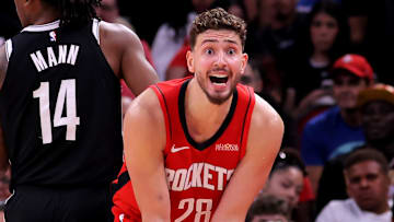 Oct 27, 2025; Houston, Texas, USA; Houston Rockets center Alperen Sengun (28) reacts after a call against the Brooklyn Nets during the fourth quarter at Toyota Center. Mandatory Credit: Erik Williams-Imagn Images
