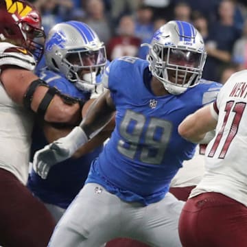 Julian Okwara pressures Carson Wentz in 2022.