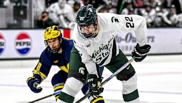 Michigan State's Porter Martone moves the puck against Michigan during the third period on Friday, Dec. 5, 2025, at Munn Ice Arena in East Lansing.