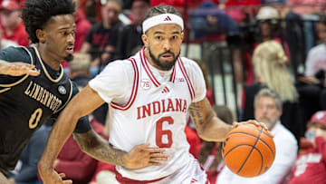 Indiana's Tayton Conerway (6) drives on Lindenwood's Mekhi Cooper (0) at Simon Skjodt Assembly Hall on Thursday, Nov. 20, 2025.