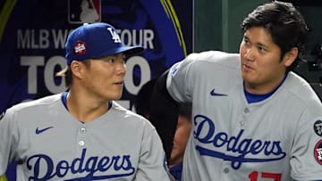 Los Angeles Dodgers starting pitcher Yoshinobu Yamamoto (18) and designated hitter Shohei Ohtani