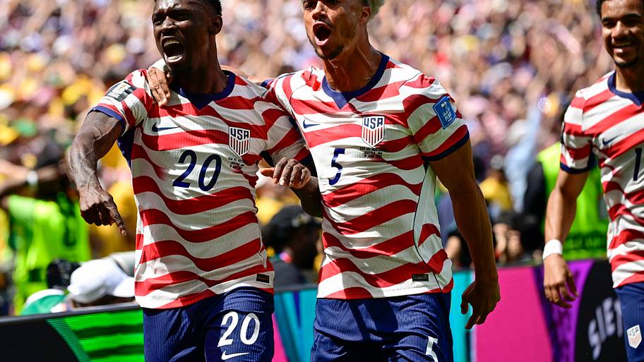 USMNT’s celebrating players, Folarin Balogun and Antonee Robinson.