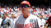  Arkansas Razorbacks coach Dave Van Horn walks off the field after the national anthem before the game against the Stanford Cardinal at Charles Schwab Field.