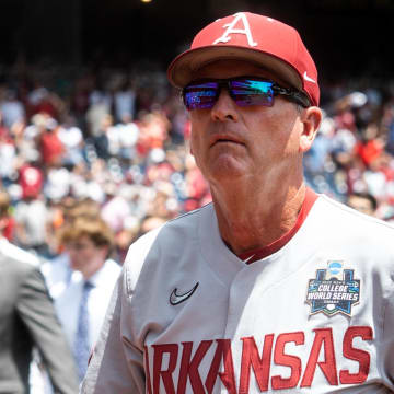  Arkansas Razorbacks coach Dave Van Horn walks off the field after the national anthem before the game against the Stanford Cardinal at Charles Schwab Field.