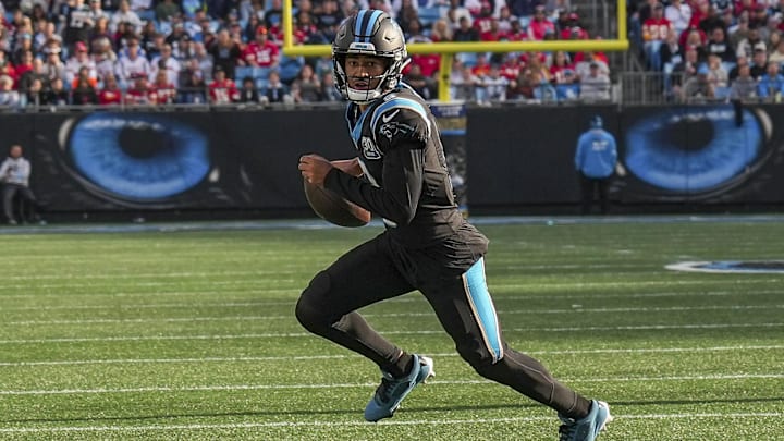 Nov 24, 2024; Charlotte, North Carolina, USA; Carolina Panthers quarterback Bryce Young (9) runs for yardage against the Kansas City Chiefs during the second half at Bank of America Stadium.