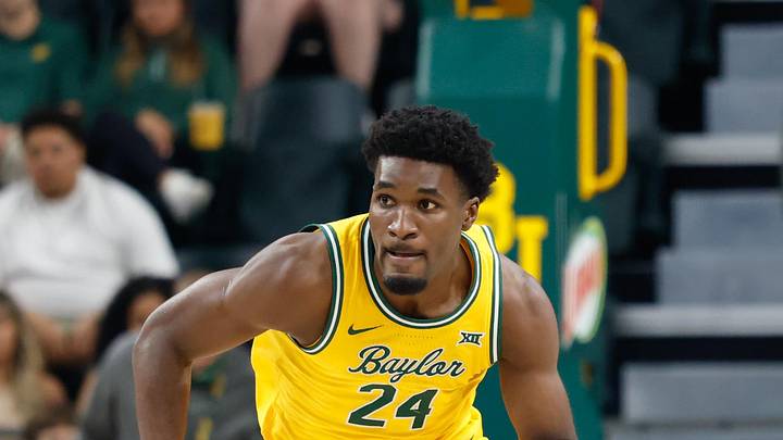 Mar 7, 2026; Waco, Texas, USA;  Baylor Bears guard Tounde Yessoufou (24) dribbles the ball up court against the Utah Utes during the first half at Paul and Alejandra Foster Pavilion. Mandatory Credit: Chris Jones-Imagn Images