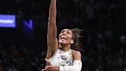 Oct 1, 2024; Brooklyn, New York, USA; Las Vegas Aces center A'ja Wilson (22) drives in for a layup in the second quarter against the New York Liberty during game two of the 2024 WNBA Semi-finals at Barclays Center. 