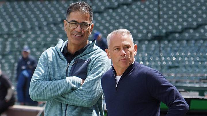May 1, 2026; Chicago, Illinois, USA; Arizona Diamondbacks executive Jason McLeod (left) and Chicago Cubs president Jed Hoyer chat on the field before the game at Wrigley Field. Mandatory Credit: David Banks-Imagn Images