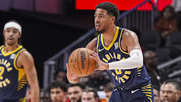 Oct 8, 2024; Atlanta, Georgia, USA; Indiana Pacers guard Tyrese Haliburton (0) passes the ball against the Atlanta Hawks during the first half at State Farm Arena. Mandatory Credit: Dale Zanine-Imagn Images
