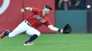 Jul 19, 2019; Cleveland, OH, USA; Cleveland Indians right fielder Tyler Naquin (30) makes a diving catch on a ball hit by Kansas City Royals shortstop Humberto Arteaga (not pictured) during the sixth inning at Progressive Field. Mandatory Credit: Ken Blaze-Imagn Images
