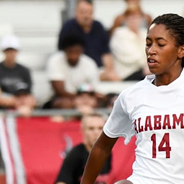Alabama forward Gianna Paul (14) takes a shot on goal. Alabama and Georgia played to a 1-1 tie at the Alabama Soccer Stadium Thursday, Sept. 14, 2023.