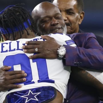 Nov 28, 2019; Arlington, TX, USA; Dallas Cowboys running back Ezekiel Elliott (21) hugs former Dallas Cowboys Emmitt Smith before the game against the Buffalo Bills at AT&T Stadium. 