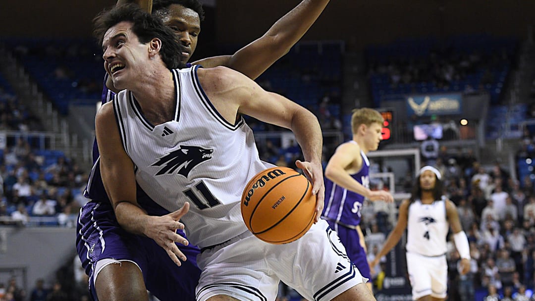 Nevada’s Nick Davidson drives while taking on Weber State at Lawlor Events Center in Reno on Nov. 13, 2024.