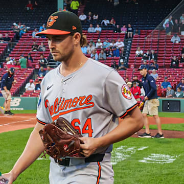 Sep 11, 2024; Boston, Massachusetts, USA; Baltimore Orioles starting pitcher Dean Kremer (64) makes his way to the bullpen before the start of the game against the Boston Red Sox at Fenway Park. 