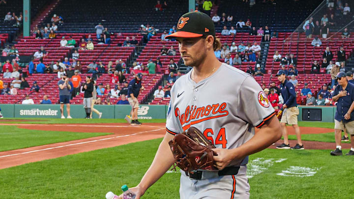 Sep 11, 2024; Boston, Massachusetts, USA; Baltimore Orioles starting pitcher Dean Kremer (64) makes his way to the bullpen before the start of the game against the Boston Red Sox at Fenway Park. 