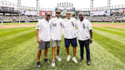 From left, White Sox pitchers Mark Buehrle, Jon Garland, Freddy Garcia and Jose Contreras pose after throwing out the first pitch before Sunday's game at Rate Field.
