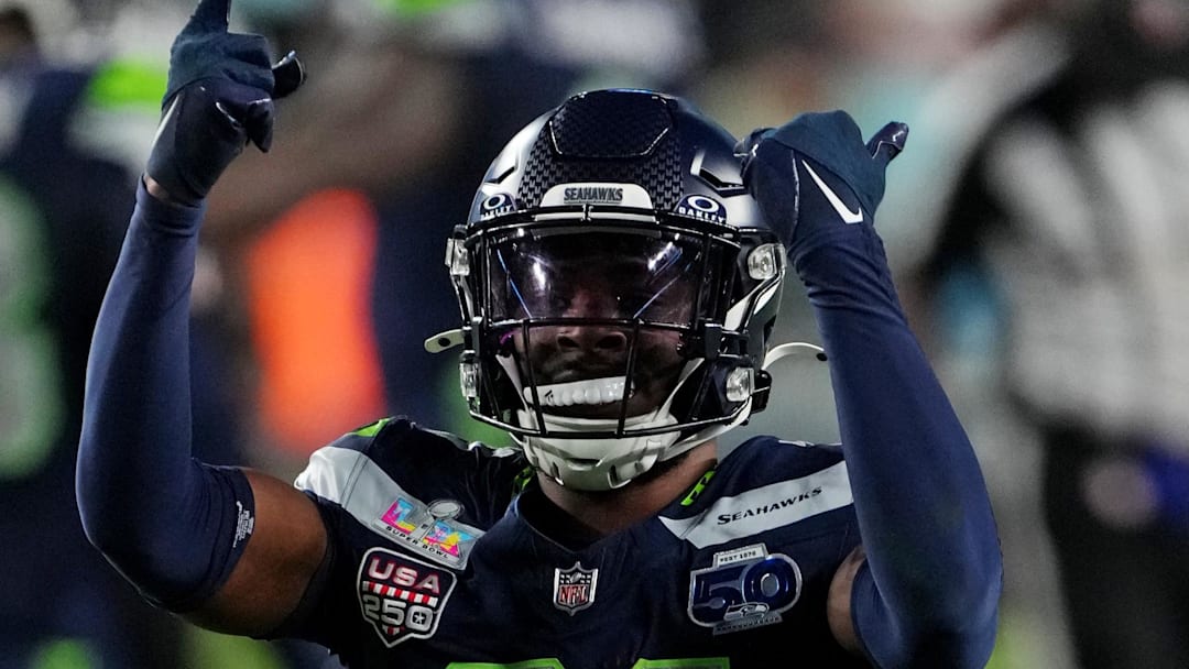 Seattle Seahawks cornerback Devon Witherspoon celebrates