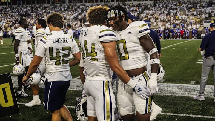 Kyle Efford and Trenilyas Tatum embrace pre-game vs Georgia State