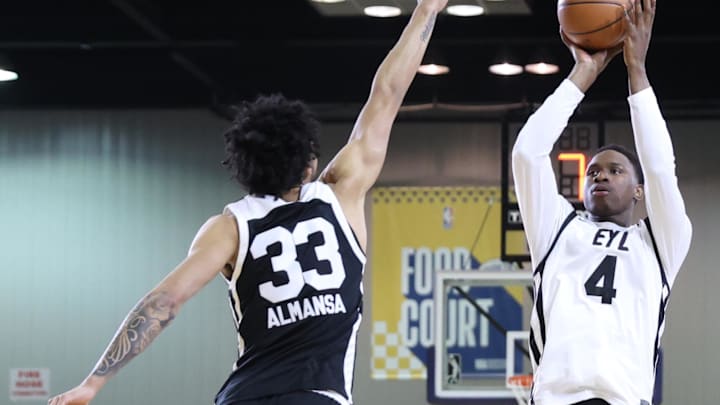 Feb 18, 2024; Indianapolis, Indiana, USA; Team ELY forward Babacar Sane (4) of the G League Ignite shoots the ball over Team BallIsLife forward Izan Almansa (33) G League Ignite during the G-League Next Up game at Indiana Convention Center. Mandatory Credit: Trevor Ruszkowski-Imagn Images