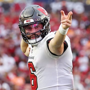 Sep 8, 2024; Tampa, Florida, USA; Tampa Bay Buccaneers quarterback Baker Mayfield (6) reacts after a first down against the Washington Commanders in the fourth quarter at Raymond James Stadium. Mandatory Credit: Nathan Ray Seebeck-Imagn Images