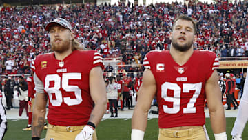 San Francisco 49ers tight end George Kittle (L) and defensive end Nick Bosa (R)