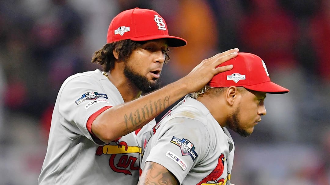 Oct 3, 2019; Atlanta, GA, USA; St. Louis Cardinals relief pitcher Carlos Martinez (18) and right fielder Jose Martinez (38) celebrate their win over the Atlanta Braves in game one of the 2019 NLDS playoff baseball series at SunTrust Park. The St. Louis Cardinals won 7-6. Mandatory Credit: Dale Zanine-Imagn Images