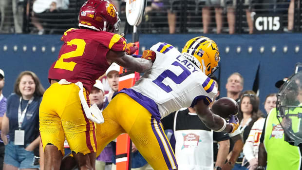 Southern California Trojans cornerback Jaylin Smith (2) breaks up a pass to LSU Tigers wide receiver Kyren Lacy (2)